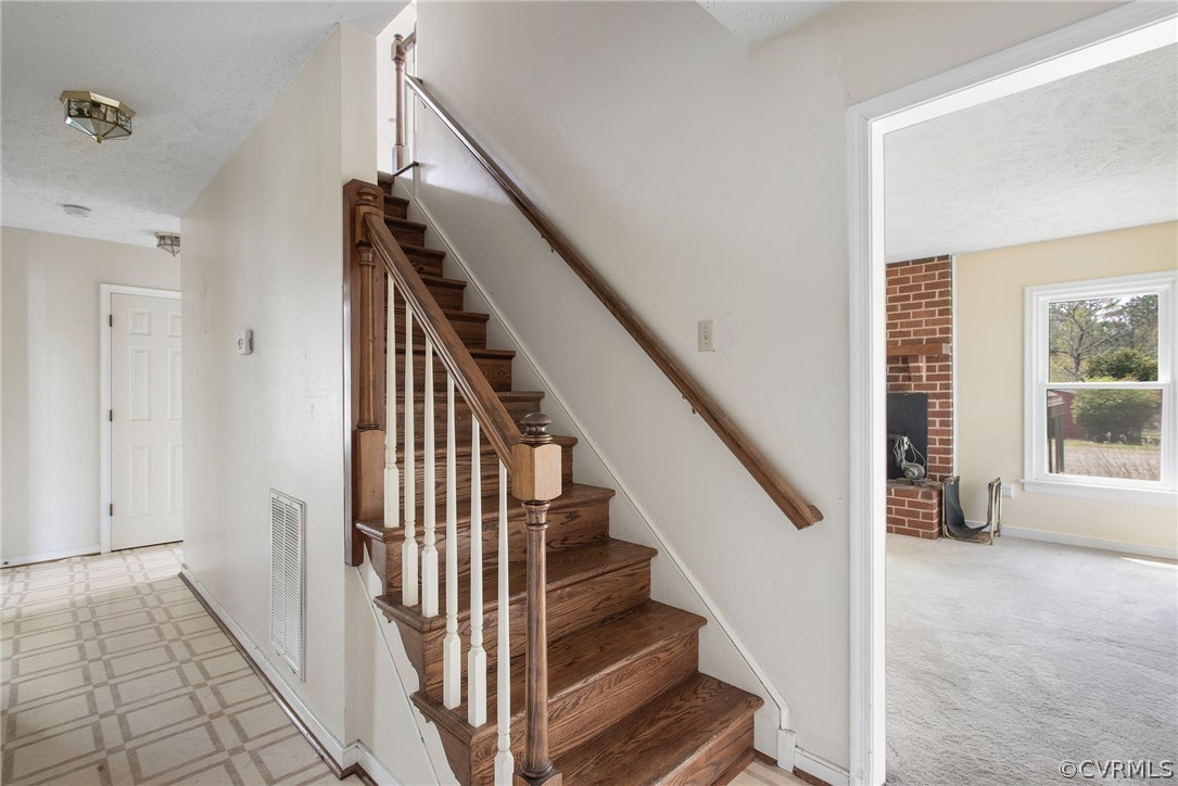 3800 Bailey Farm Road Moseley, VA 23120 - Photo 6 of 48 a view of an entryway with staircase