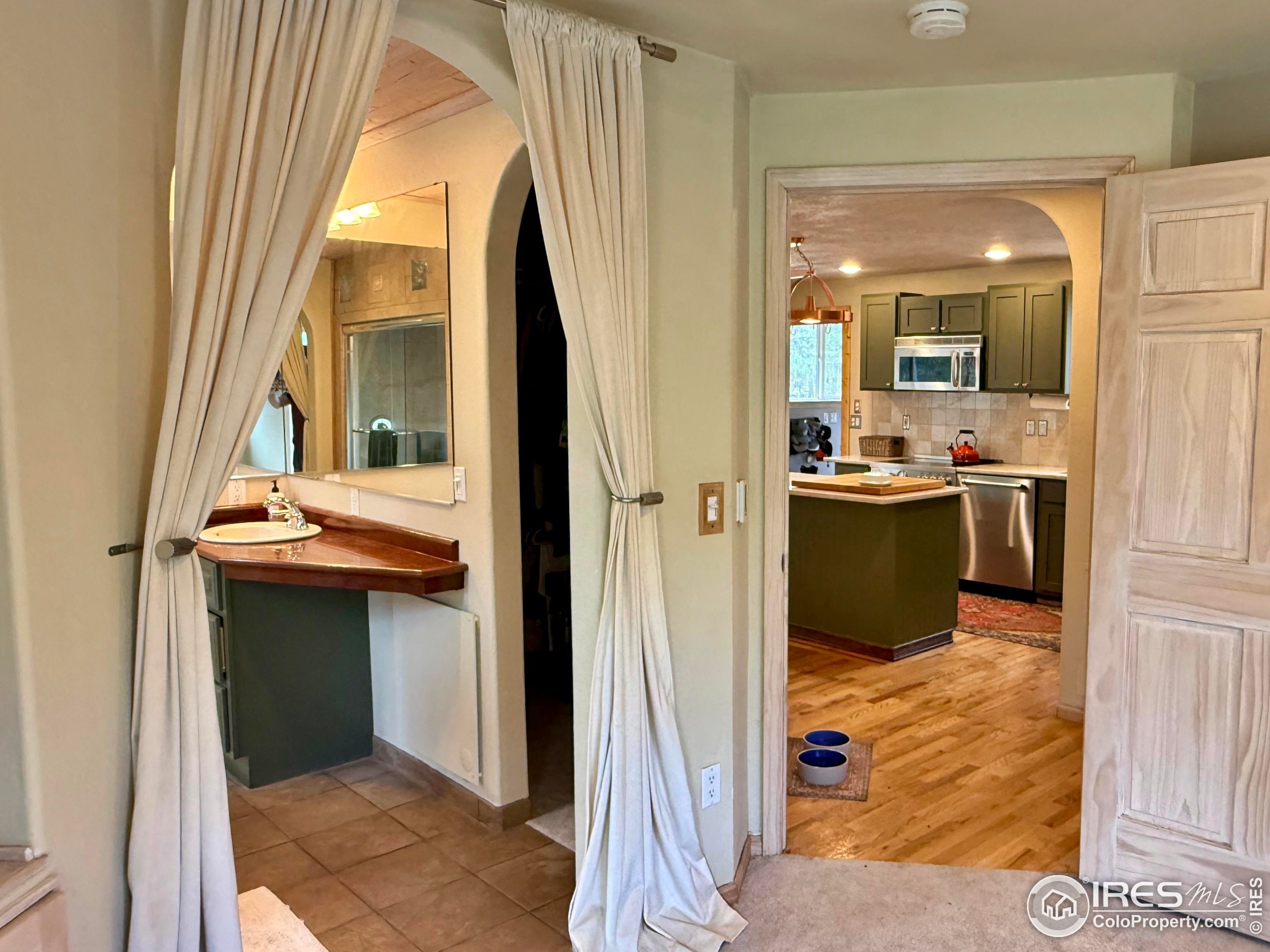 84 Ranch Road Ward, CO 80481 - Photo 13 of 45 a kitchen view with a sink and refrigerator