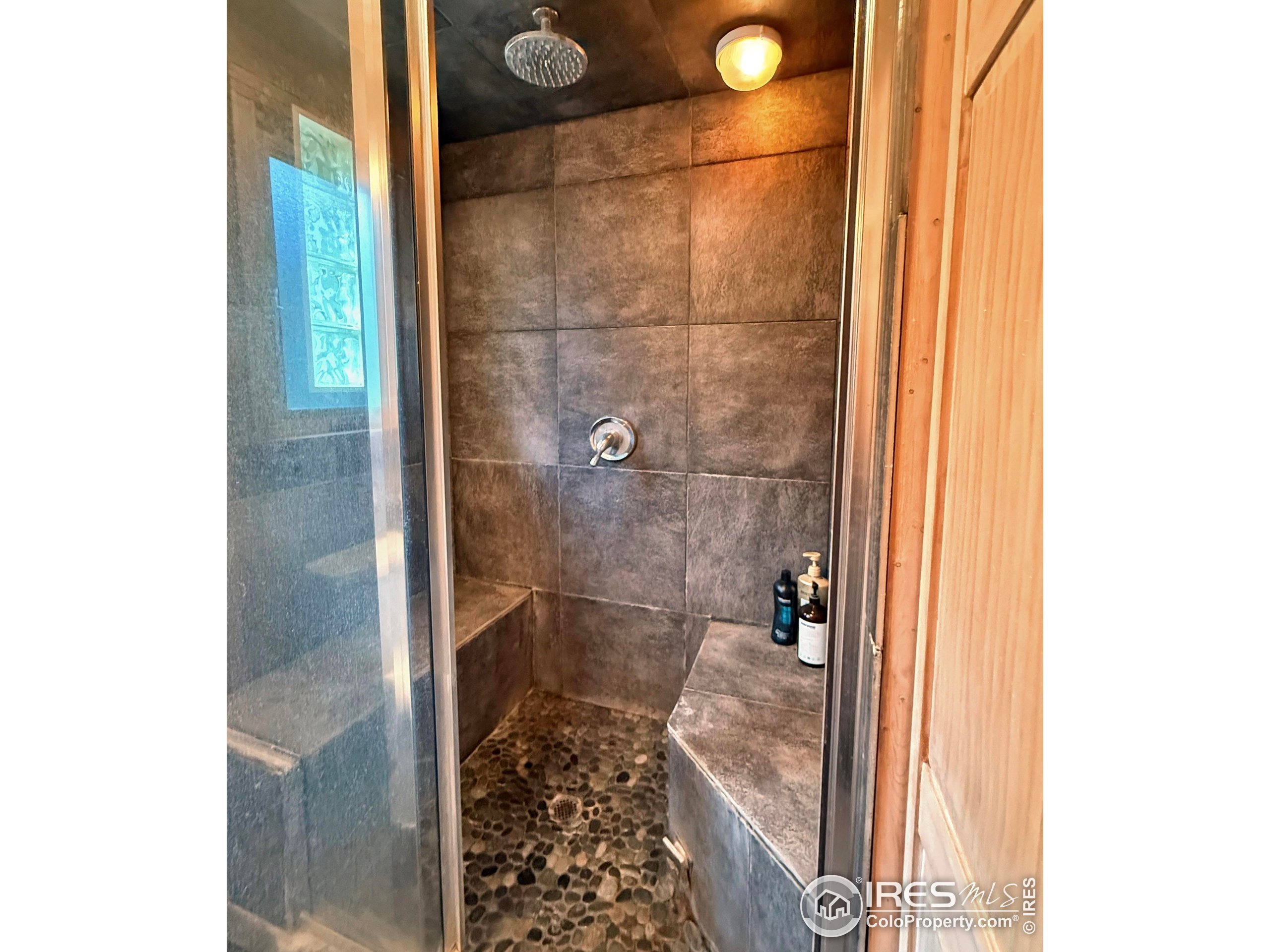 84 Ranch Road Ward, CO 80481 - Photo 19 of 45 a bathroom with a shower