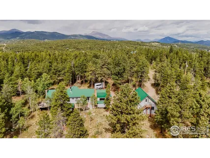 a bathroom with a sink and a yard in back