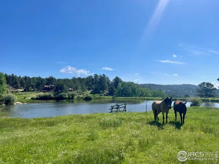 a view of a lake with a mountain in the background