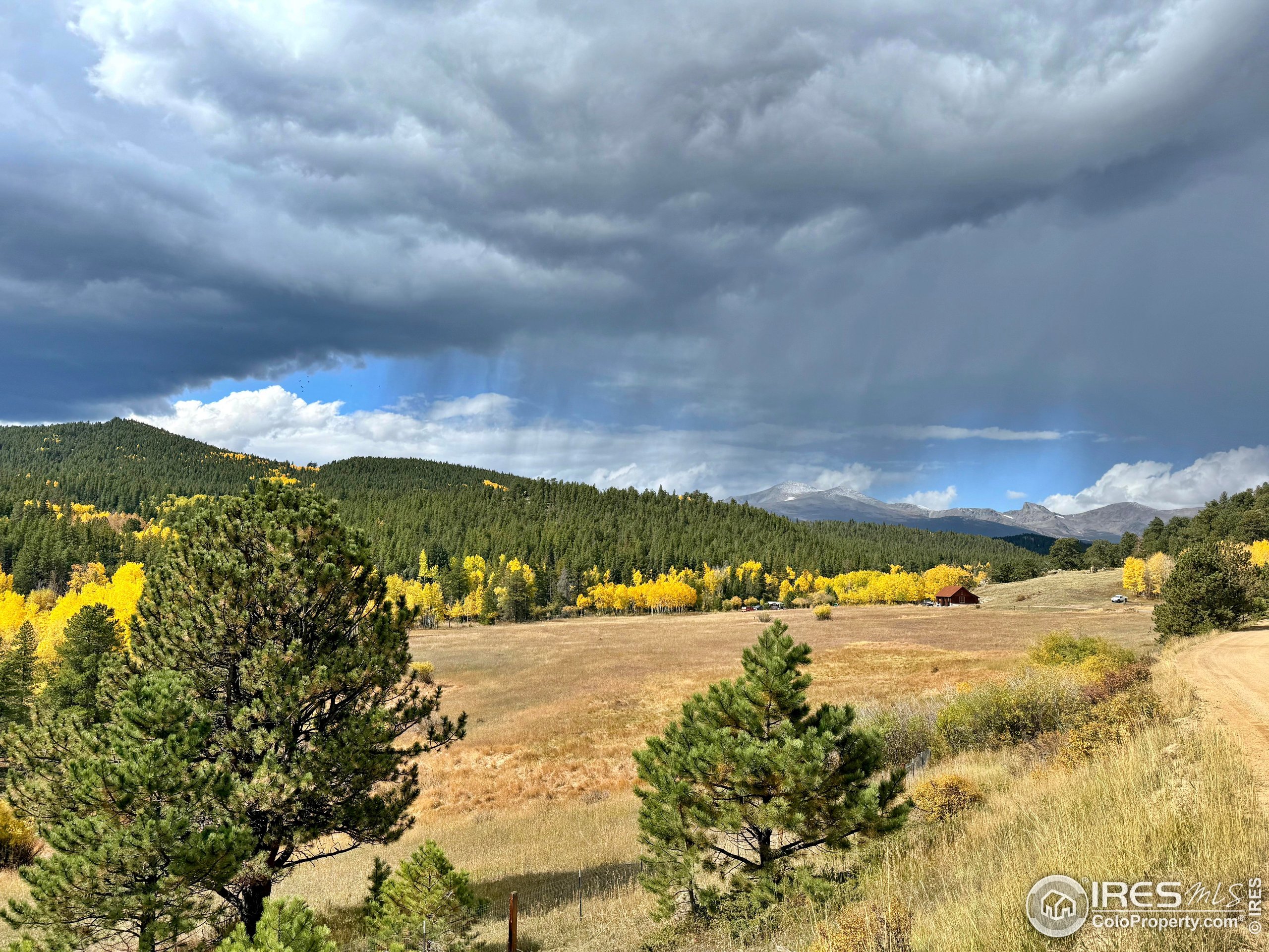 84 Ranch Road Ward, CO 80481 - Photo 42 of 45 a view of a lake and mountain