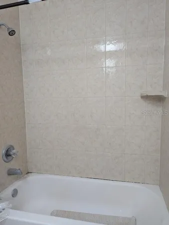 a bathroom with a bathtub