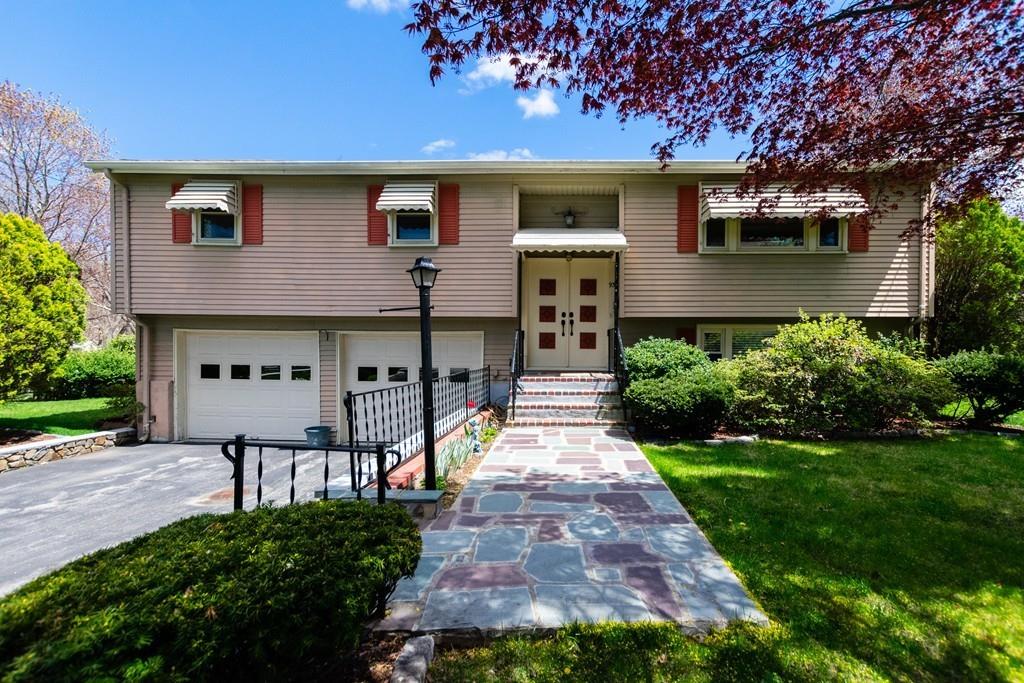 93 Graymore Road Waltham, MA 02451 - Photo 1 of 32 a front view of a house with garden