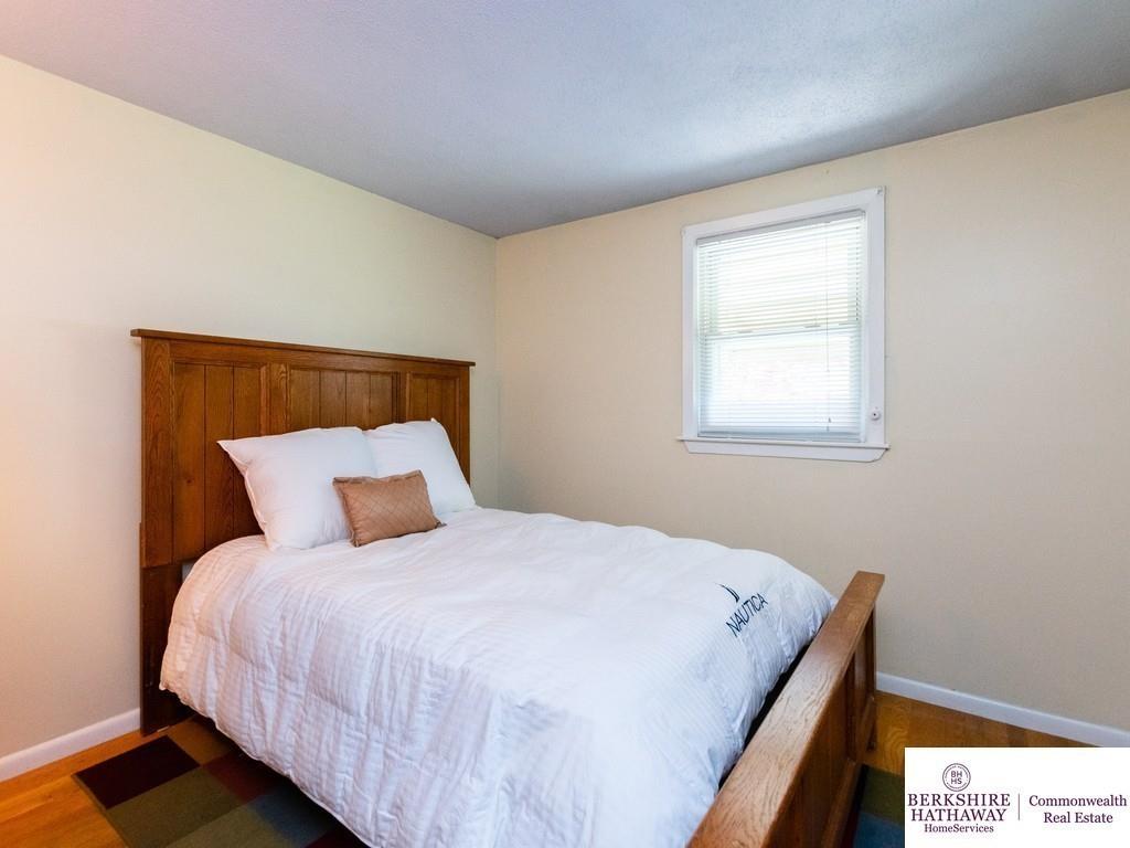 93 Graymore Road Waltham, MA 02451 - Photo 15 of 32 a large bed sitting in a bedroom next to a window