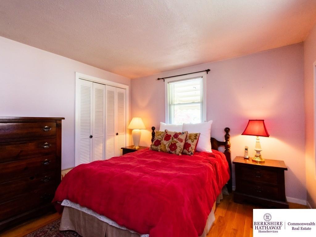 93 Graymore Road Waltham, MA 02451 - Photo 17 of 32 a bed room with a bed and a night stand