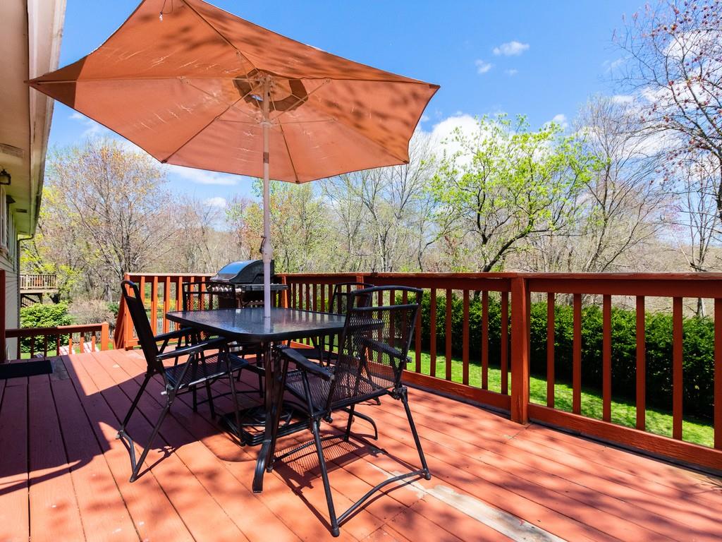 93 Graymore Road Waltham, MA 02451 - Photo 20 of 32 a view of a balcony with furniture and wooden floor