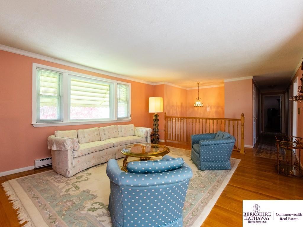 93 Graymore Road Waltham, MA 02451 - Photo 10 of 32 a living room with furniture and a table