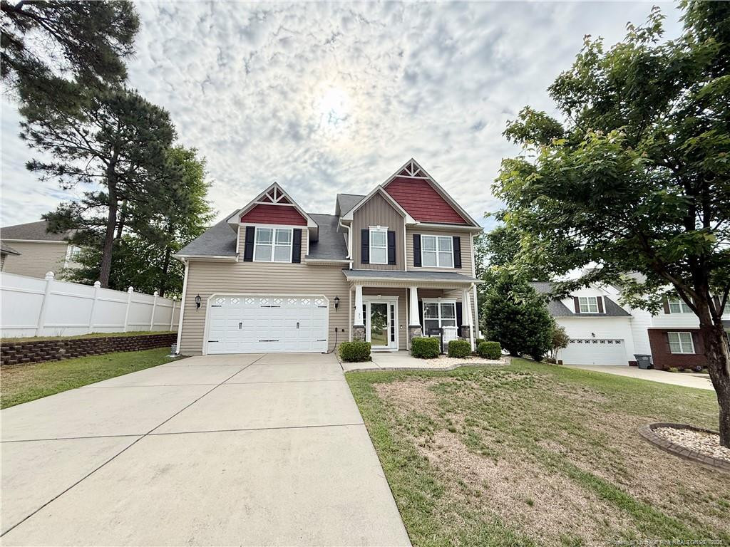 35 Ambrose Point Cameron, NC 28326 - Photo 2 of 31 a front view of a house with a yard and trees