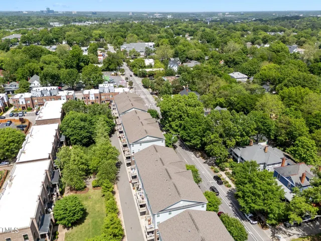 an aerial view of a city with lots of residential buildings