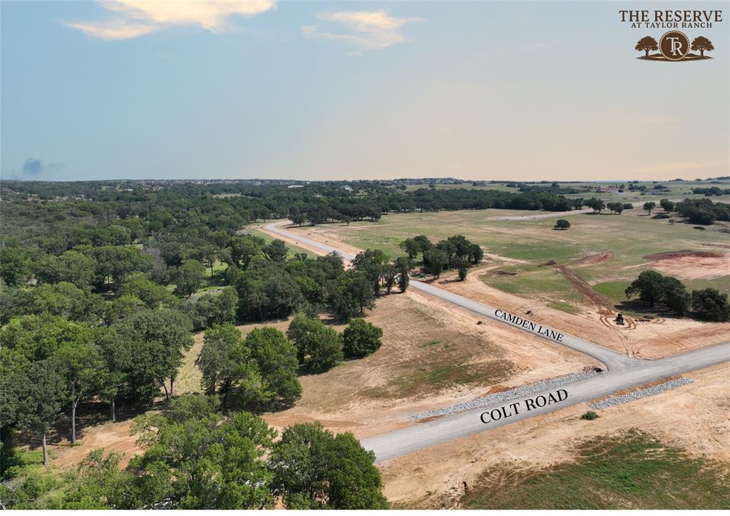 Lot 16 Colt Road Springtown, TX 76082 - Photo 5 of 12 a view of a lake from a yard