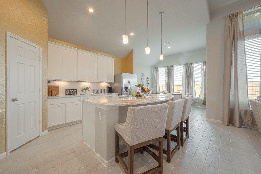 1061 Apple Ridge Road Magnolia, TX 77355 - Photo 20 of 49 a kitchen with a sink cabinets and window