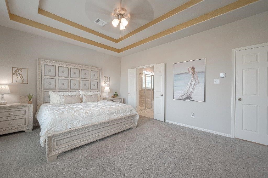 1061 Apple Ridge Road Magnolia, TX 77355 - Photo 37 of 49 a spacious bedroom with a bed and closet