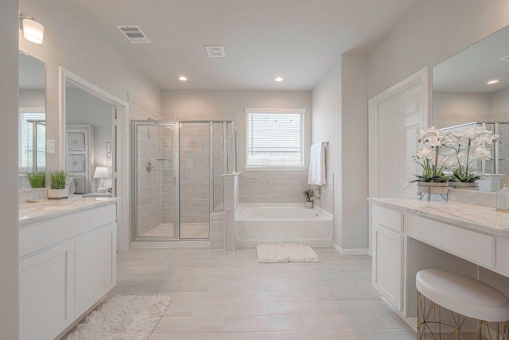 1061 Apple Ridge Road Magnolia, TX 77355 - Photo 44 of 49 a bathroom with a granite countertop sink a toilet a mirror and shower