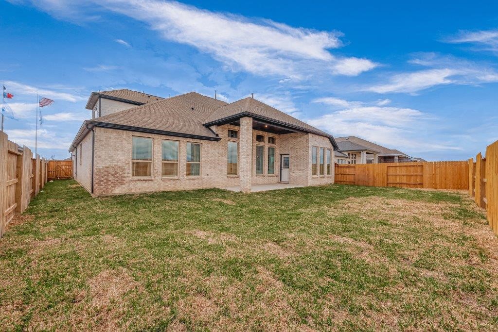 1061 Apple Ridge Road Magnolia, TX 77355 - Photo 49 of 49 a view of a house with a backyard