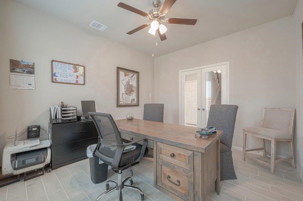 1061 Apple Ridge Road Magnolia, TX 77355 - Photo 7 of 49 a view of a workspace with furniture