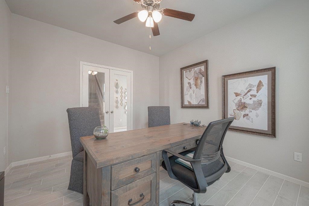 1061 Apple Ridge Road Magnolia, TX 77355 - Photo 8 of 49 a view of a dining room with furniture and chandelier