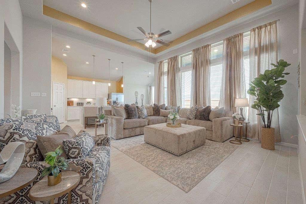 1061 Apple Ridge Road Magnolia, TX 77355 - Photo 10 of 49 a living room with furniture and a large window