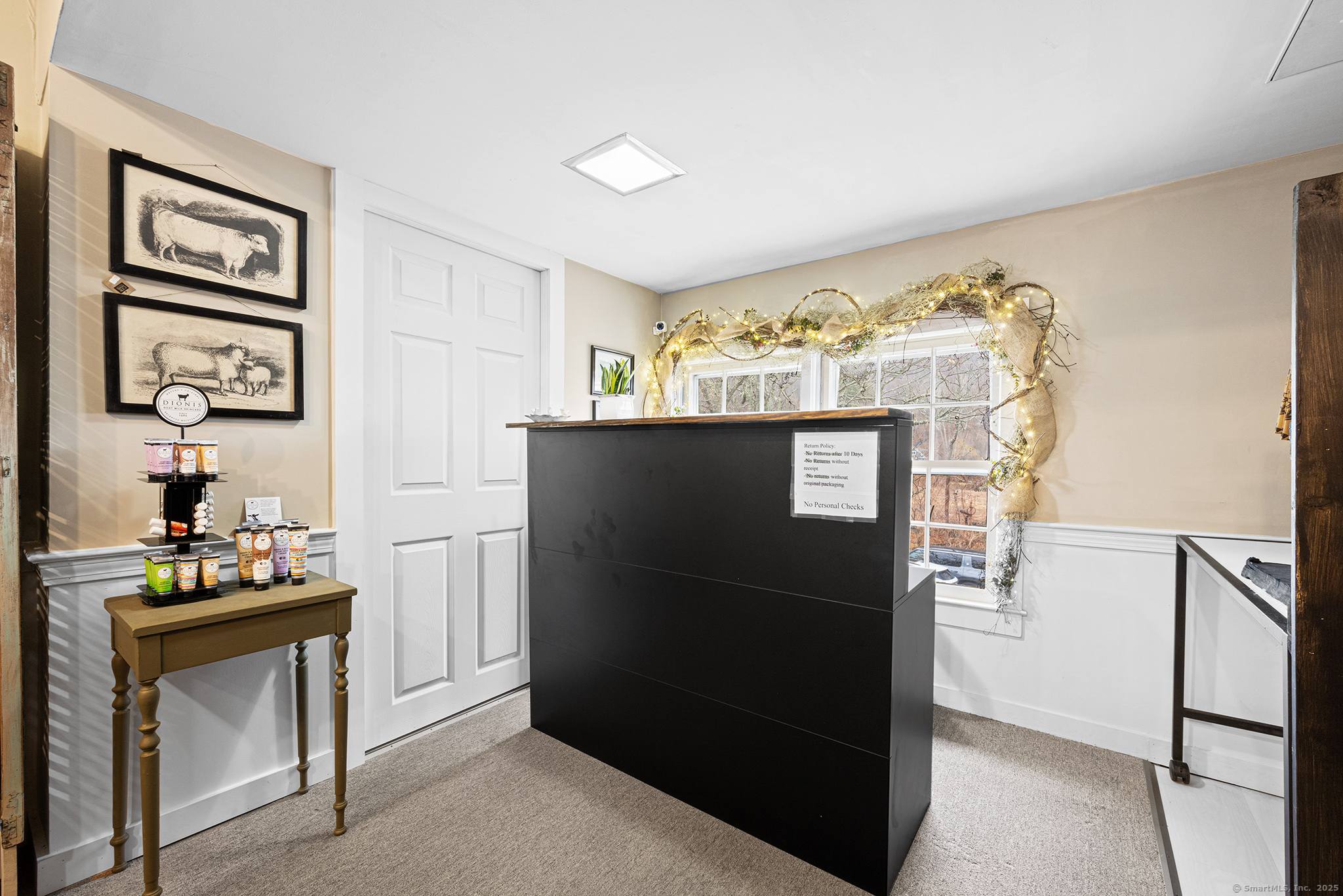2 Norwich Road East Haddam, CT 06423 - Photo 20 of 39 a view of a refrigerator in kitchen and an empty room