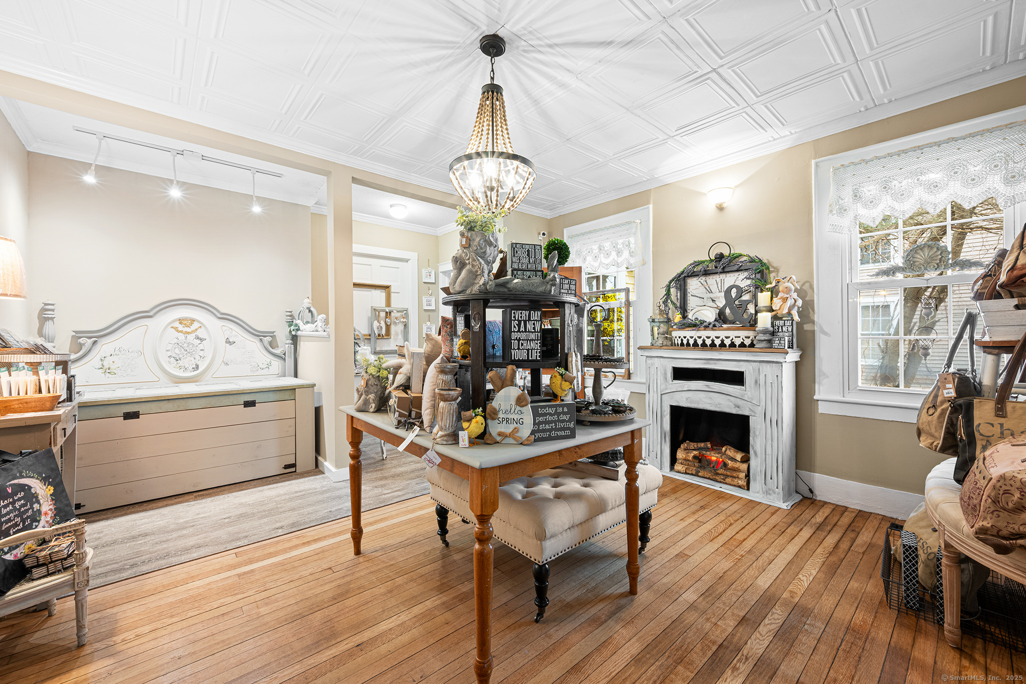 2 Norwich Road East Haddam, CT 06423 - Photo 23 of 39 a living room with furniture a fireplace and wooden floor