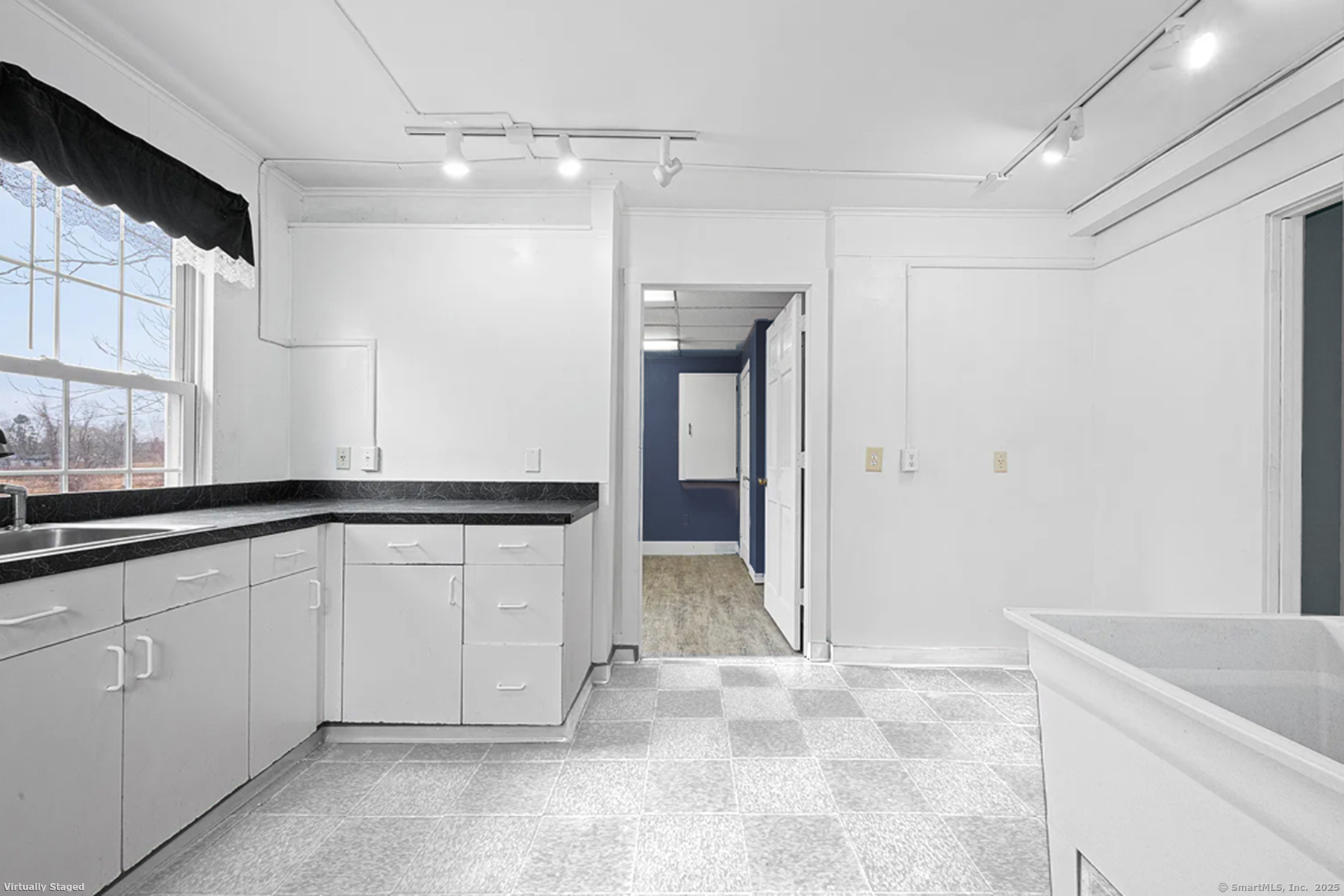 2 Norwich Road East Haddam, CT 06423 - Photo 27 of 39 a view of a kitchen with a sink and cabinets