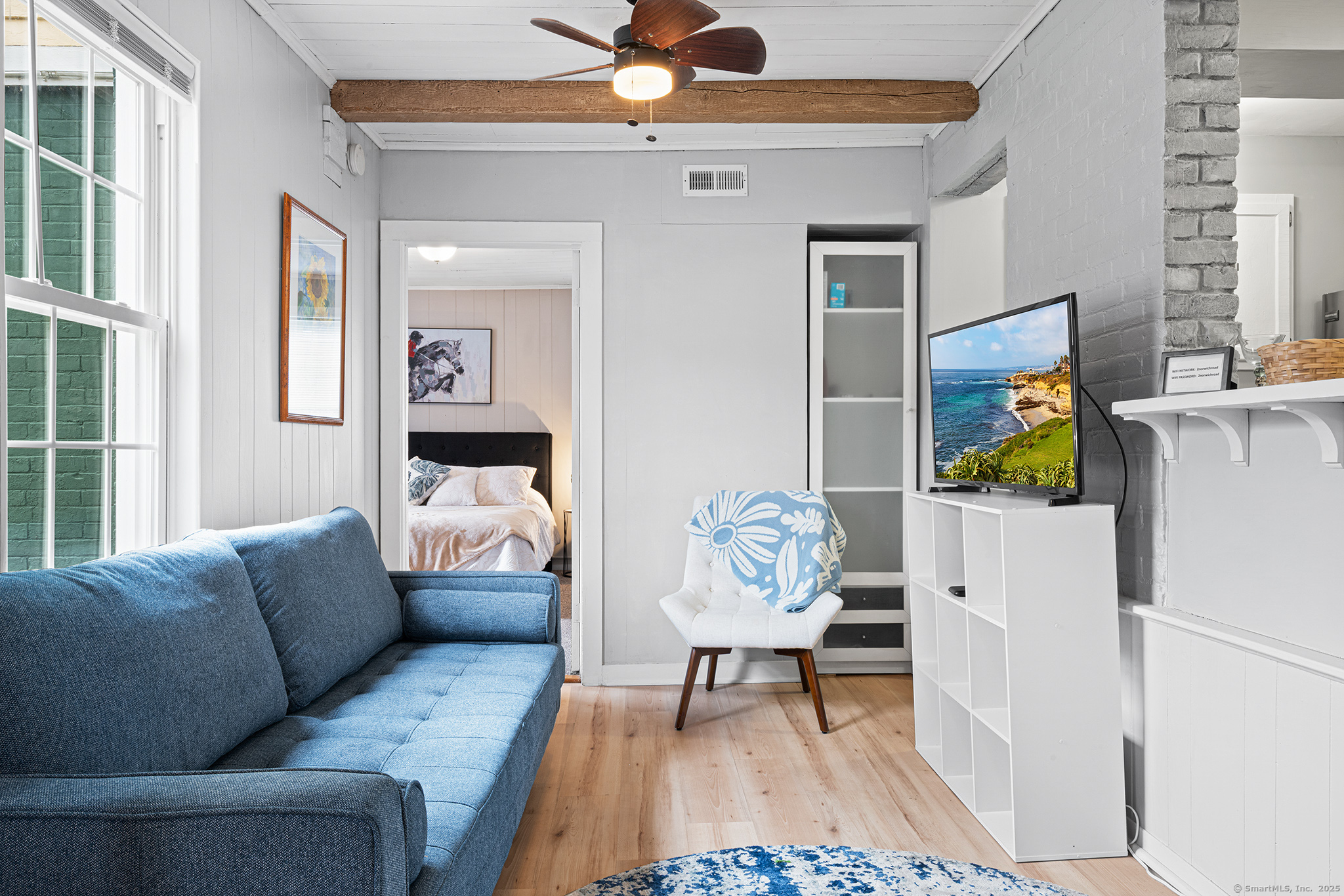 2 Norwich Road East Haddam, CT 06423 - Photo 3 of 39 a living room with furniture and a chandelier