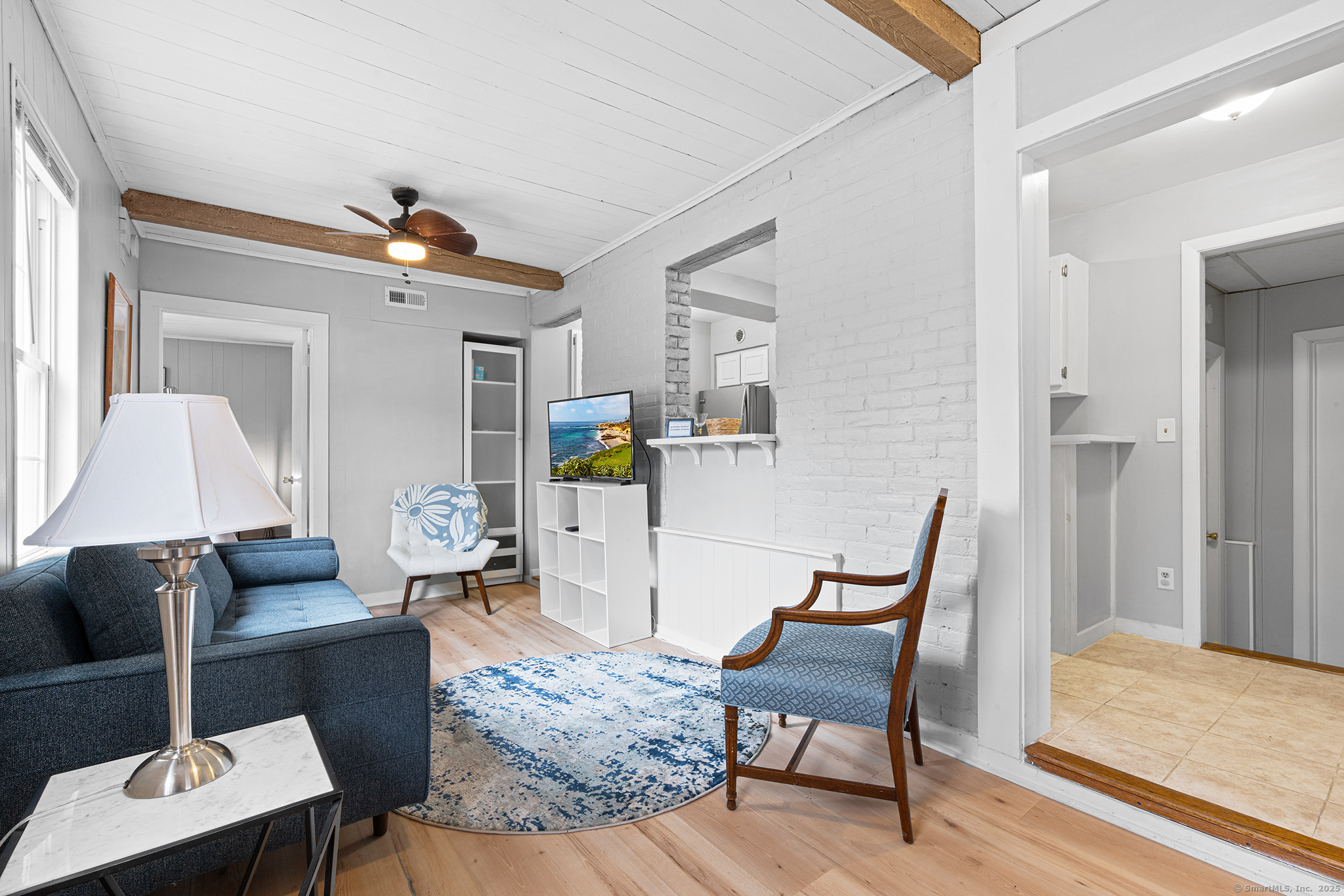 2 Norwich Road East Haddam, CT 06423 - Photo 4 of 39 a living room with furniture and wooden floor