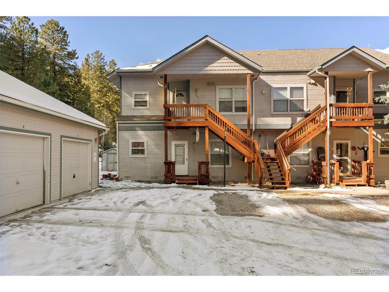 5720 Co Road, Unit 101A Bailey, CO 80421 - Photo 1 of 46 and garage is the one closest to the unit.