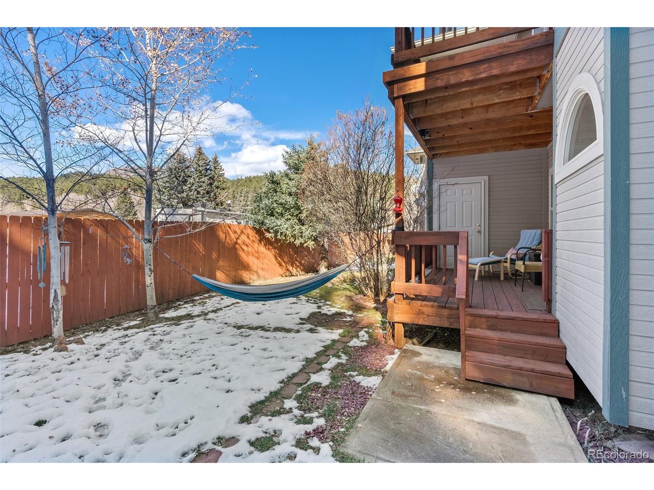 5720 Co Road, Unit 101A Bailey, CO 80421 - Photo 26 of 46 Back yard and porch
