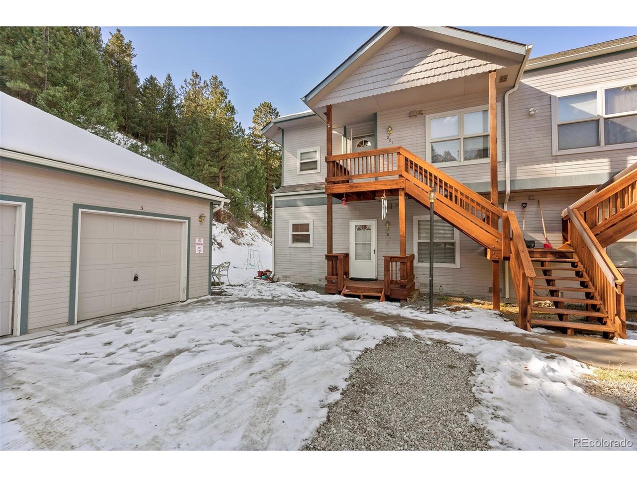 5720 Co Road, Unit 101A Bailey, CO 80421 - Photo 3 of 46 and garage is the one closest to the unit.