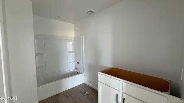 a view of an outdoor space and tennis court