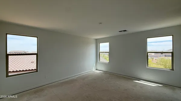 a view of a street from a balcony