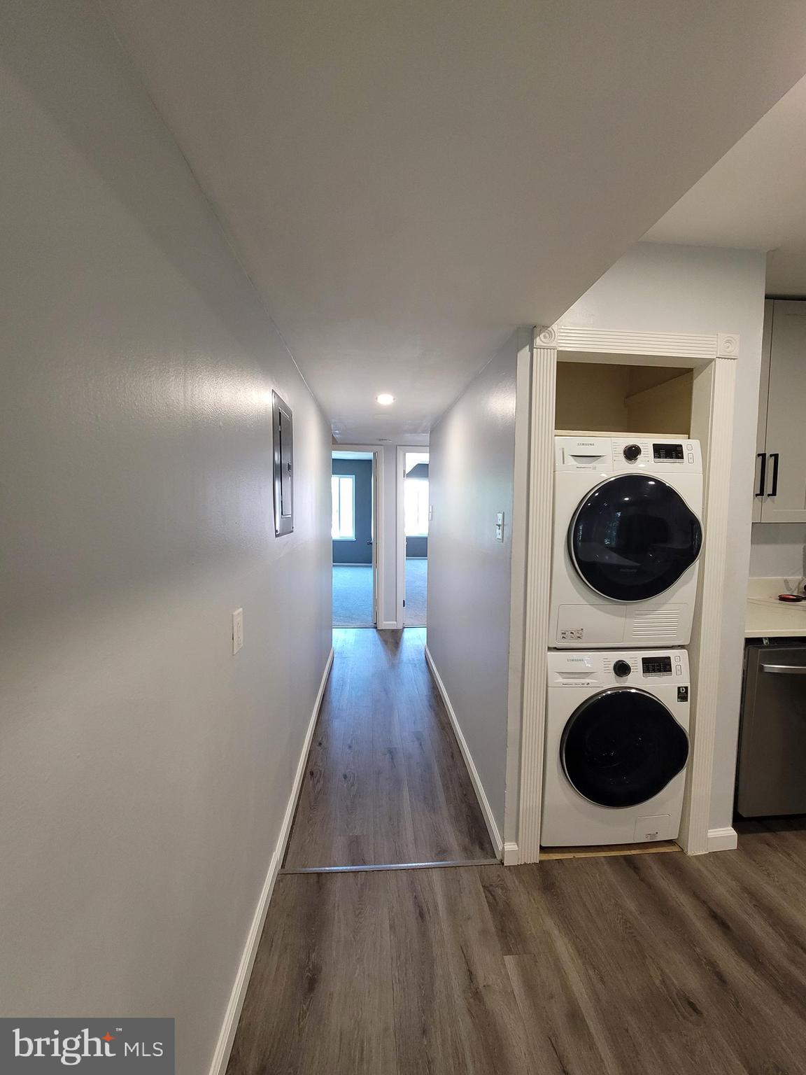 5049 7th Road South, Unit 201 Arlington, VA 22204 - Photo 16 of 45 a view of a hallway with a washer and dryer