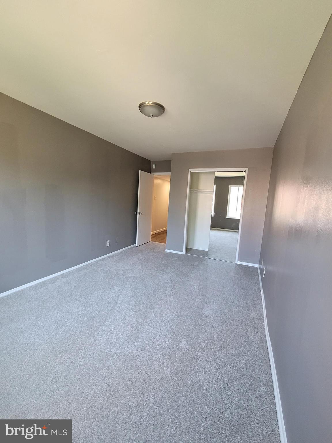 5049 7th Road South, Unit 201 Arlington, VA 22204 - Photo 26 of 45 a view of an empty room with a window