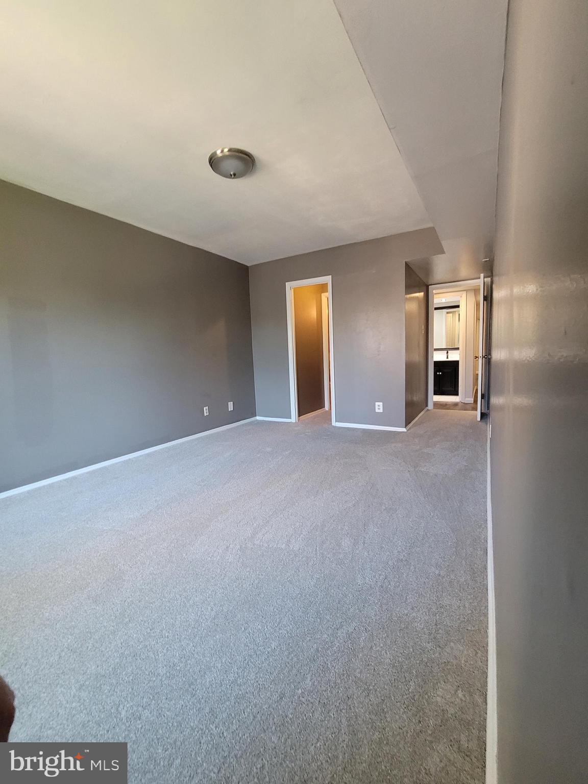 5049 7th Road South, Unit 201 Arlington, VA 22204 - Photo 28 of 45 a view of a big room with windows and cabinet