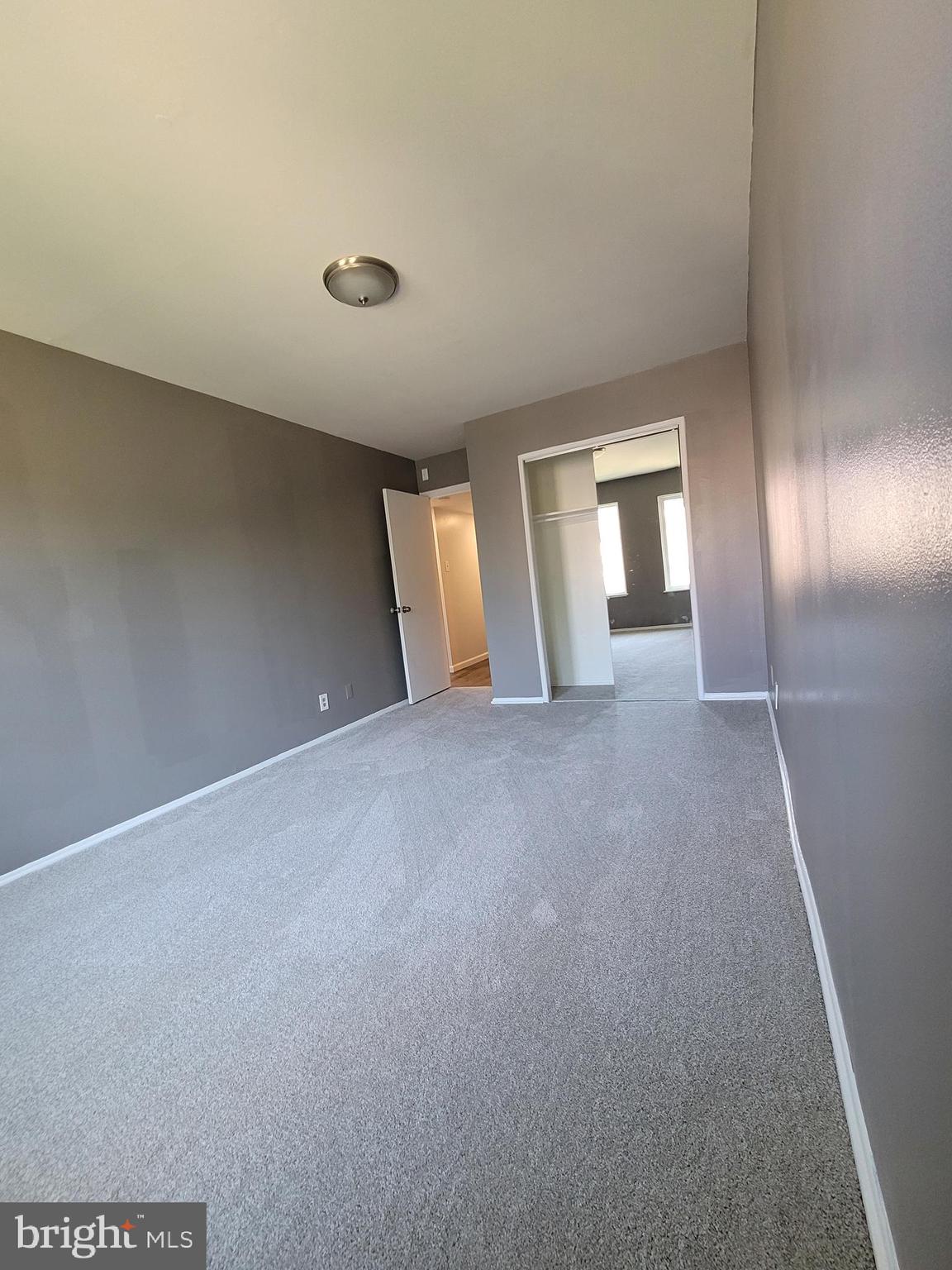 5049 7th Road South, Unit 201 Arlington, VA 22204 - Photo 29 of 45 a view of an empty room and window