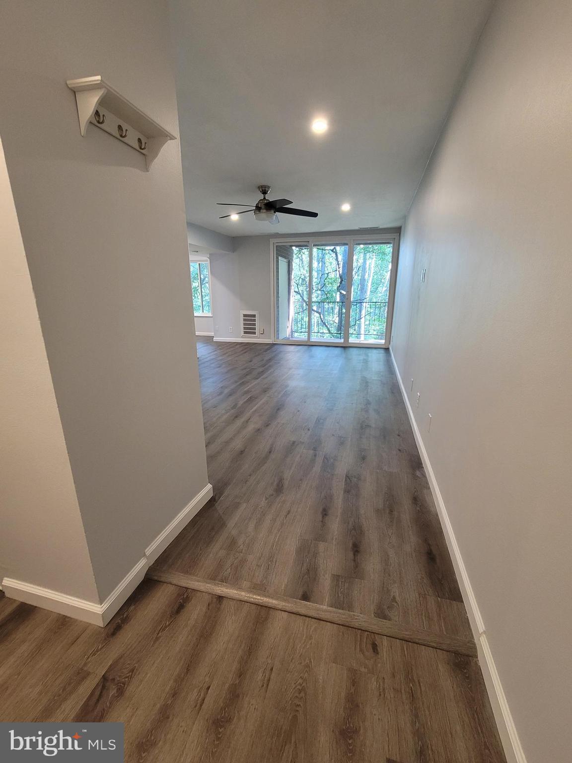 5049 7th Road South, Unit 201 Arlington, VA 22204 - Photo 3 of 45 wooden floor in an empty room with a window