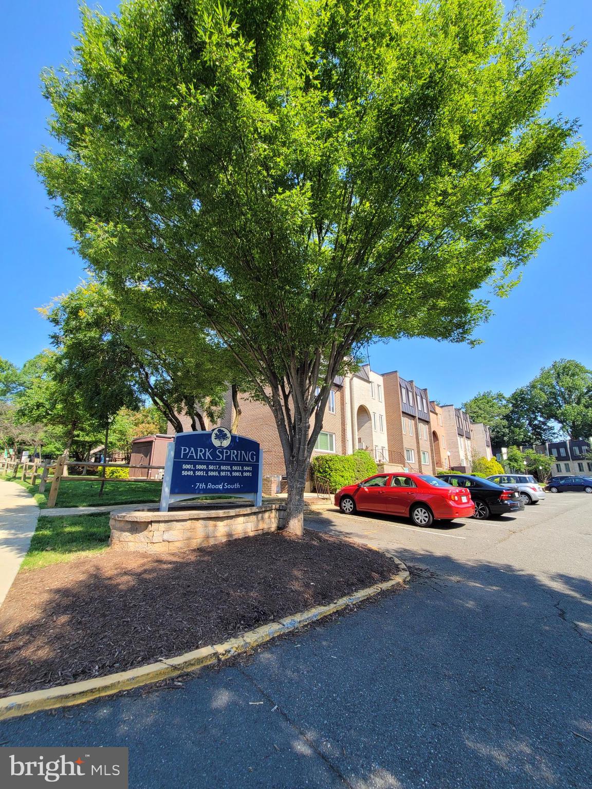 5049 7th Road South, Unit 201 Arlington, VA 22204 - Photo 37 of 45 a front view of a house with tree s