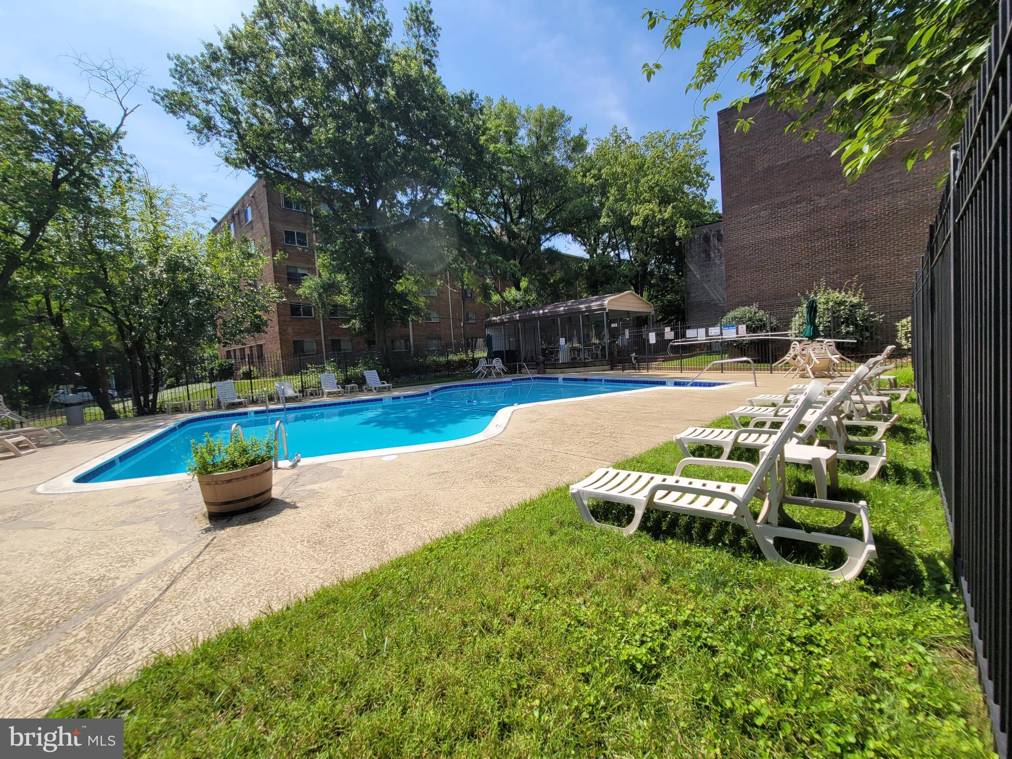 5049 7th Road South, Unit 201 Arlington, VA 22204 - Photo 39 of 45 a view of a backyard with swimming pool