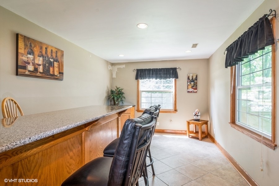 28 Jack Street Plano, IL 60545 - Photo 11 of 21 a very nice looking dining room with a large window