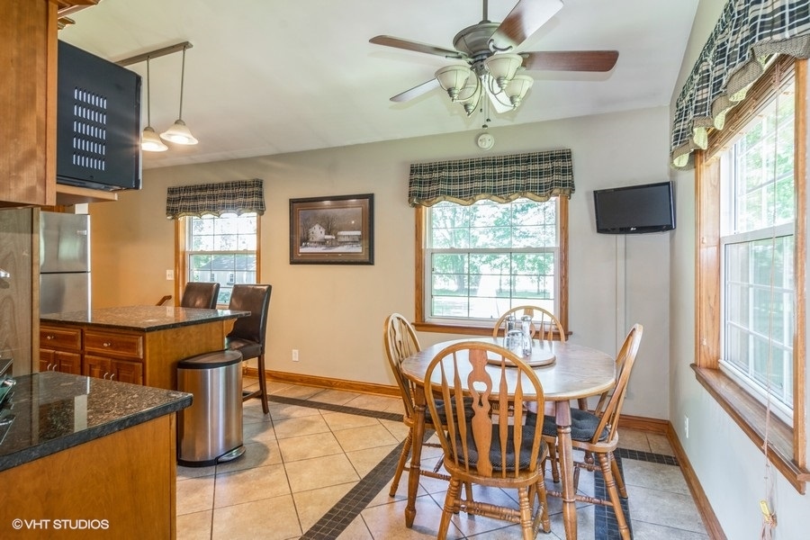 28 Jack Street Plano, IL 60545 - Photo 9 of 21 a view of a dining room with furniture window and outside view