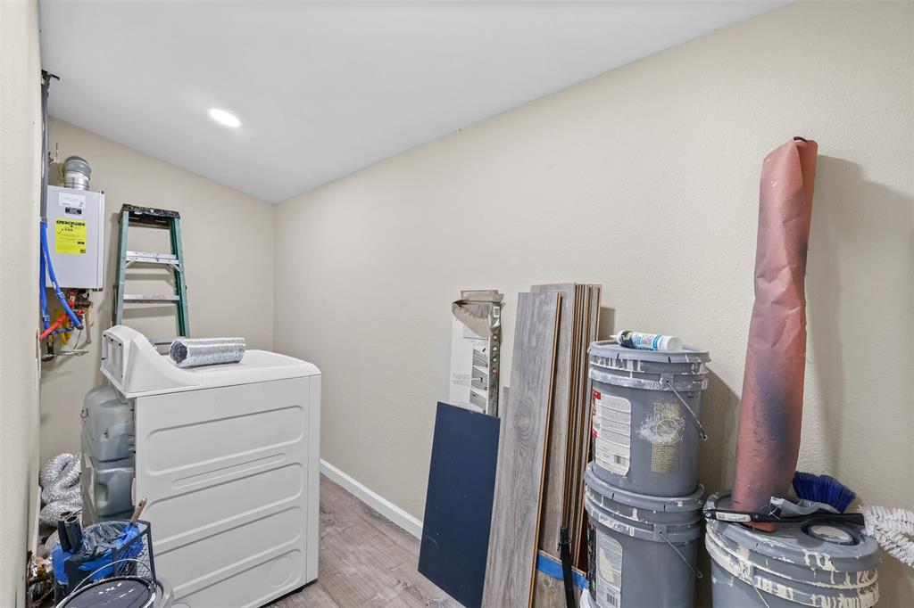 10319 Old Seagoville Road Dallas, TX 75217 - Photo 10 of 14 a room with storage and utility