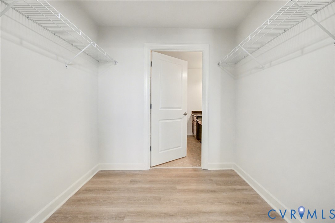 1101 Haxall Point, Unit U711 Richmond, VA 23219 - Photo 12 of 47 a view of a livingroom with wooden floor