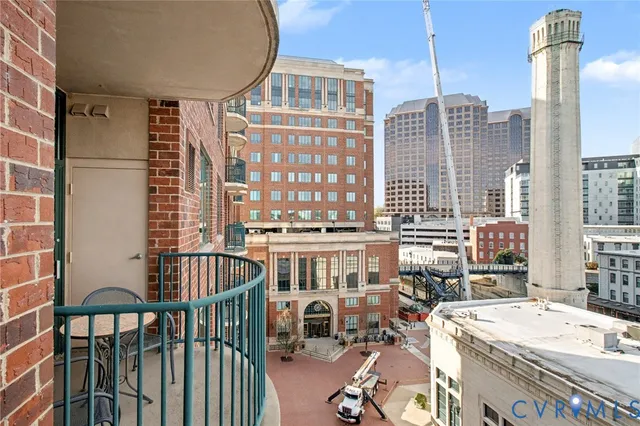 a view of a balcony with many windows