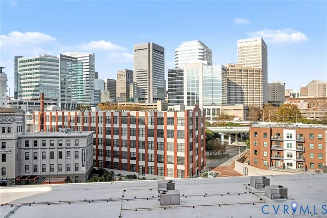 a view of city with tall buildings