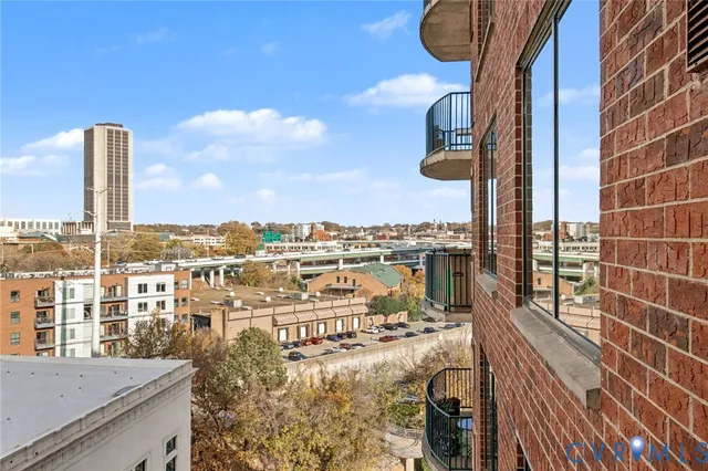 a view of a balcony with city view