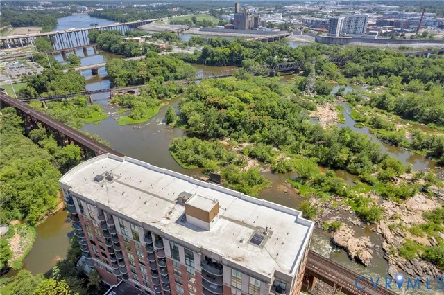 a view of a balcony with a table and chairs