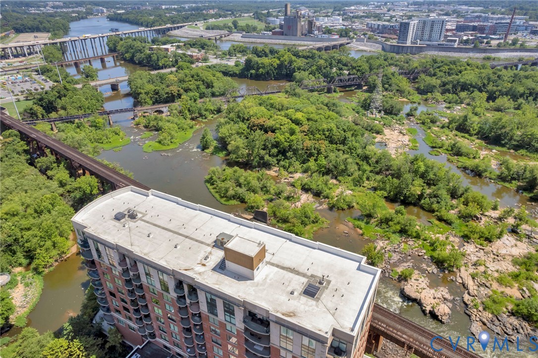 1101 Haxall Point, Unit U711 Richmond, VA 23219 - Photo 26 of 47 a view of a balcony with a table and chairs