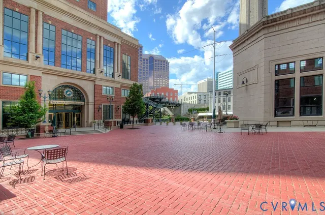 a view of a building with sitting area