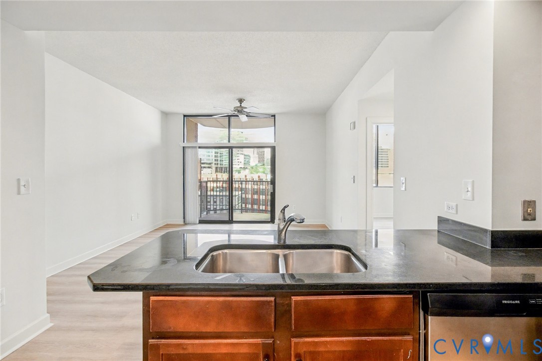 1101 Haxall Point, Unit U711 Richmond, VA 23219 - Photo 7 of 47 a kitchen with a sink and a window